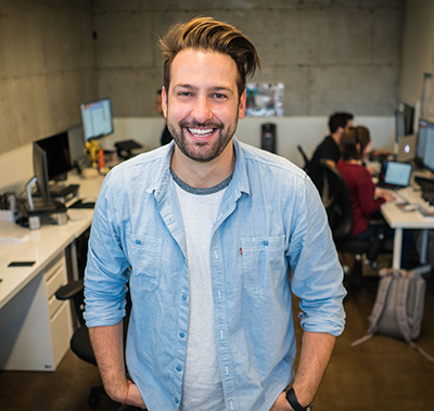 image of a man smiling in an office